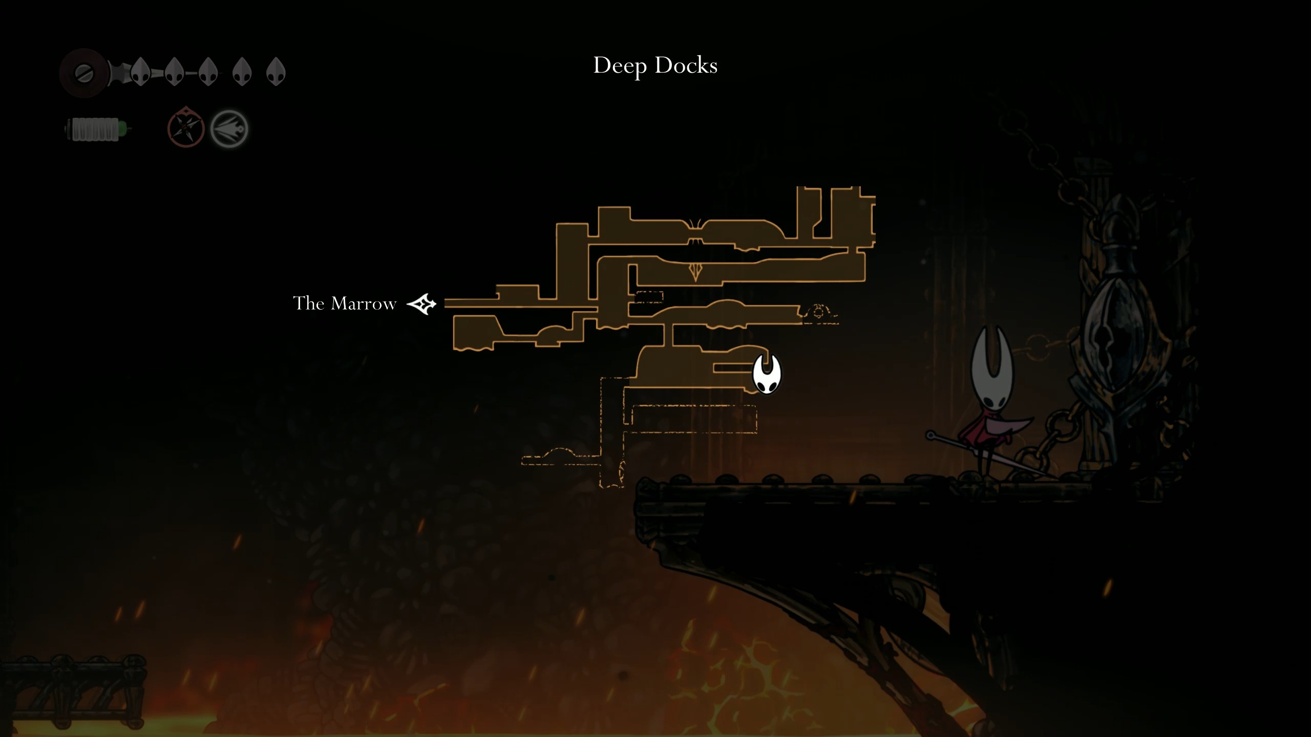The ornate Simple Lock in the Deep Docks lower area of Hollow Knight: Silksong.