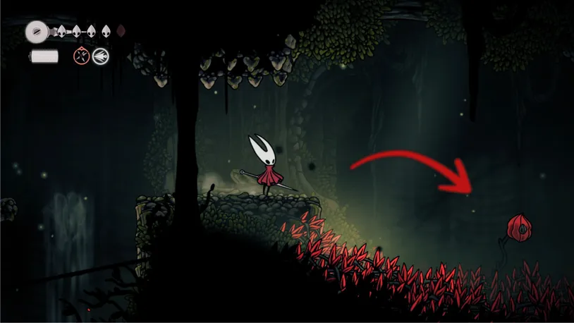 Hornet collecting a glowing Memory Locket from a hanging cage.