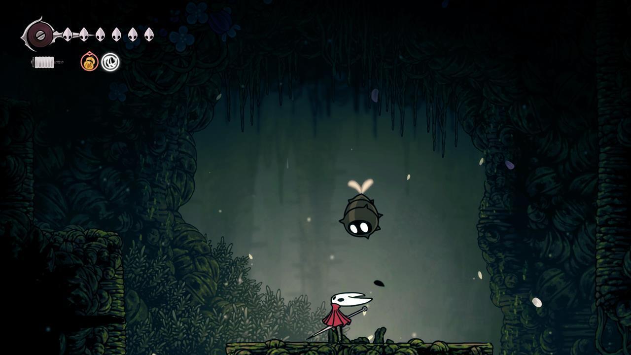 Hornet reaching Pollip Heart #2 in a hidden alcove along Shellwood's left wall in Hollow Knight: Silksong