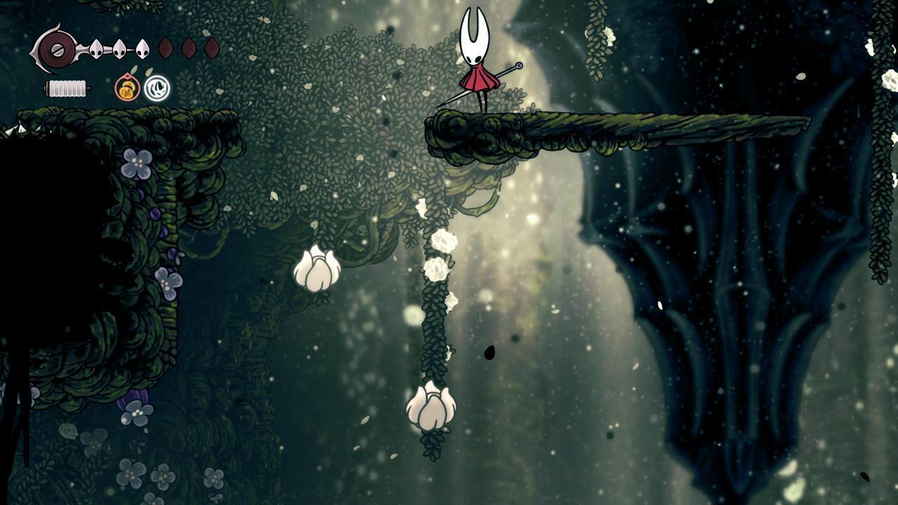 Hornet finding Pollip Heart #3 in a vine-covered nook post-Sister Splinter area in Hollow Knight: Silksong