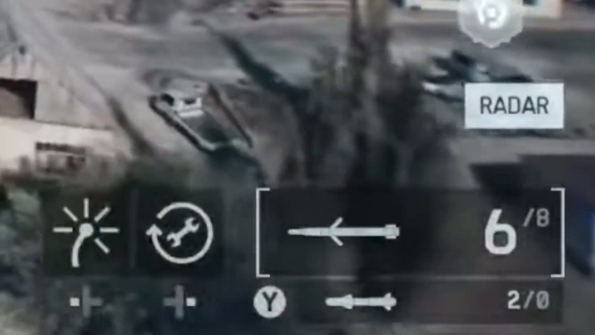 First-person view from a helicopter cockpit showing the air-to-air missile lock-on interface targeting an enemy jet.