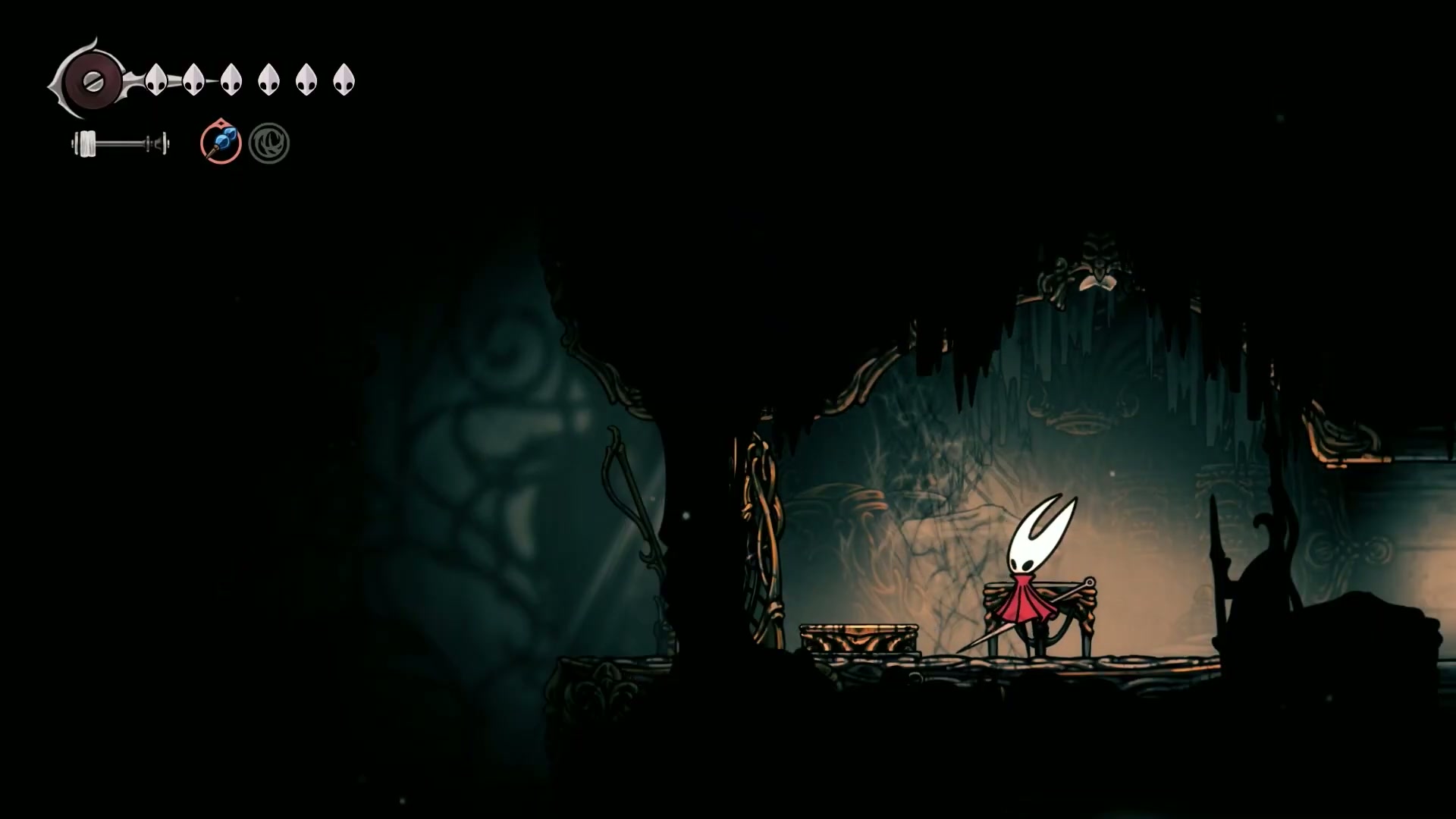 Hornet collecting a Mask Shard in the Cogwork Core area of Silksong.