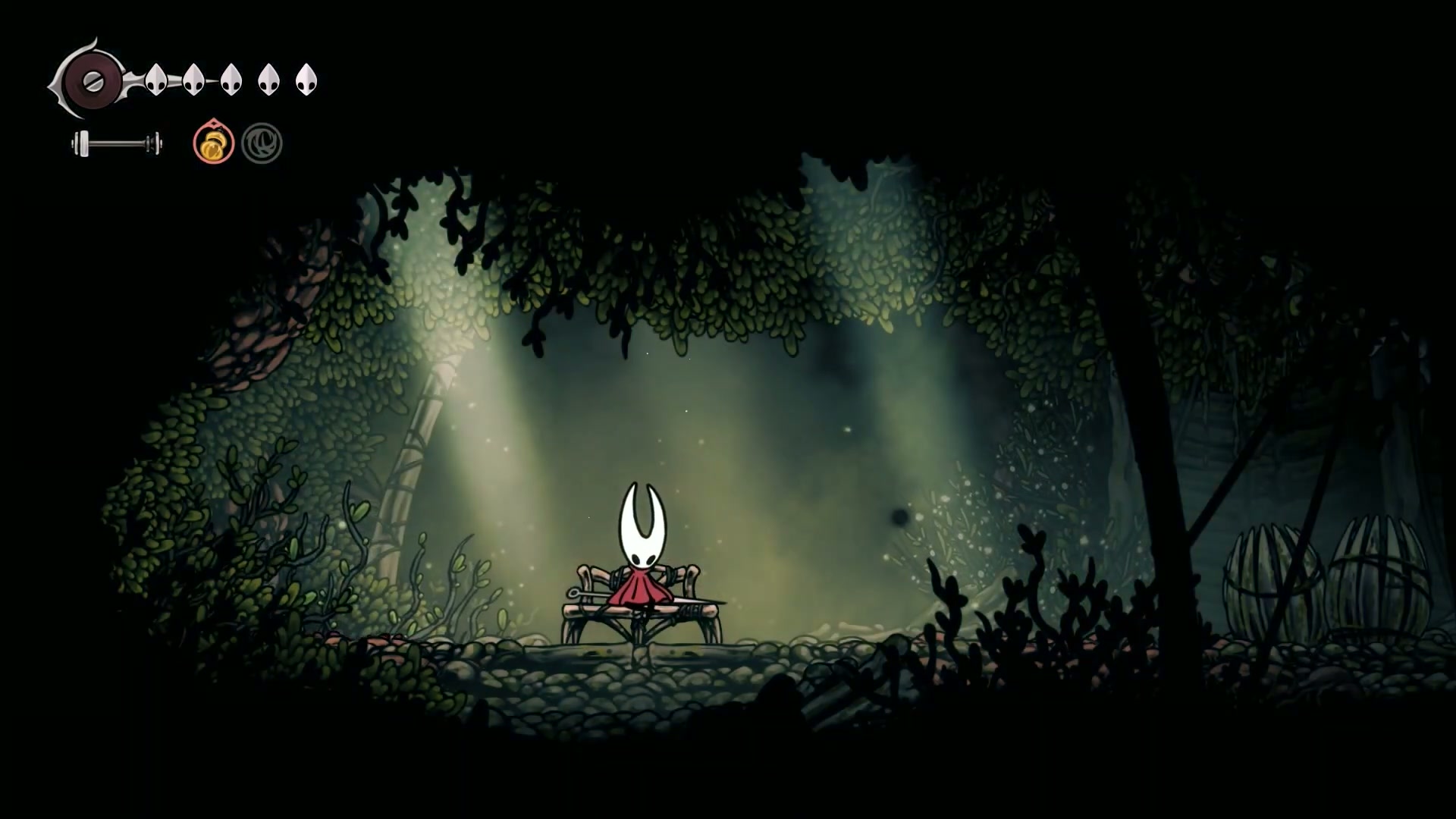 A visual of the troll bench glowing menacingly before the trap is sprung in Silksong