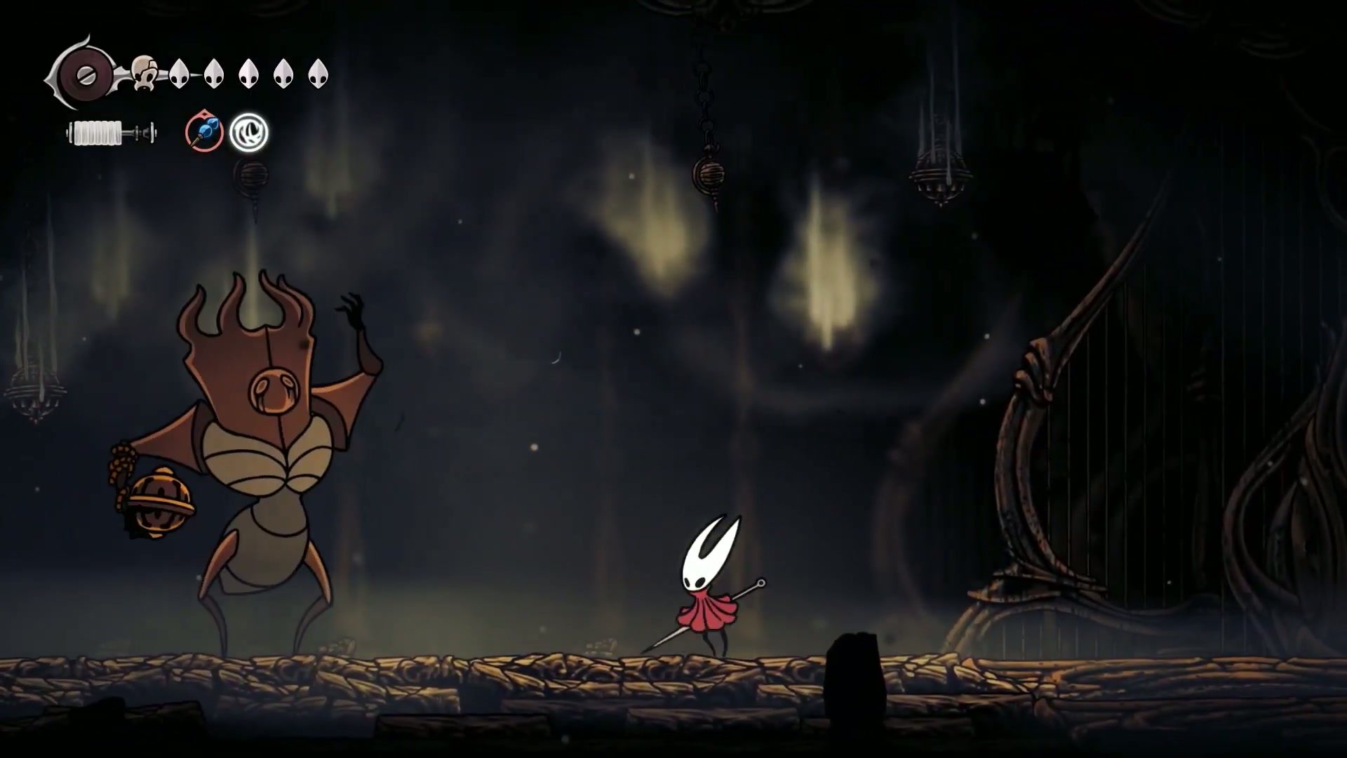 Hornet dodging a spin attack from The Last Judge in Phase 1