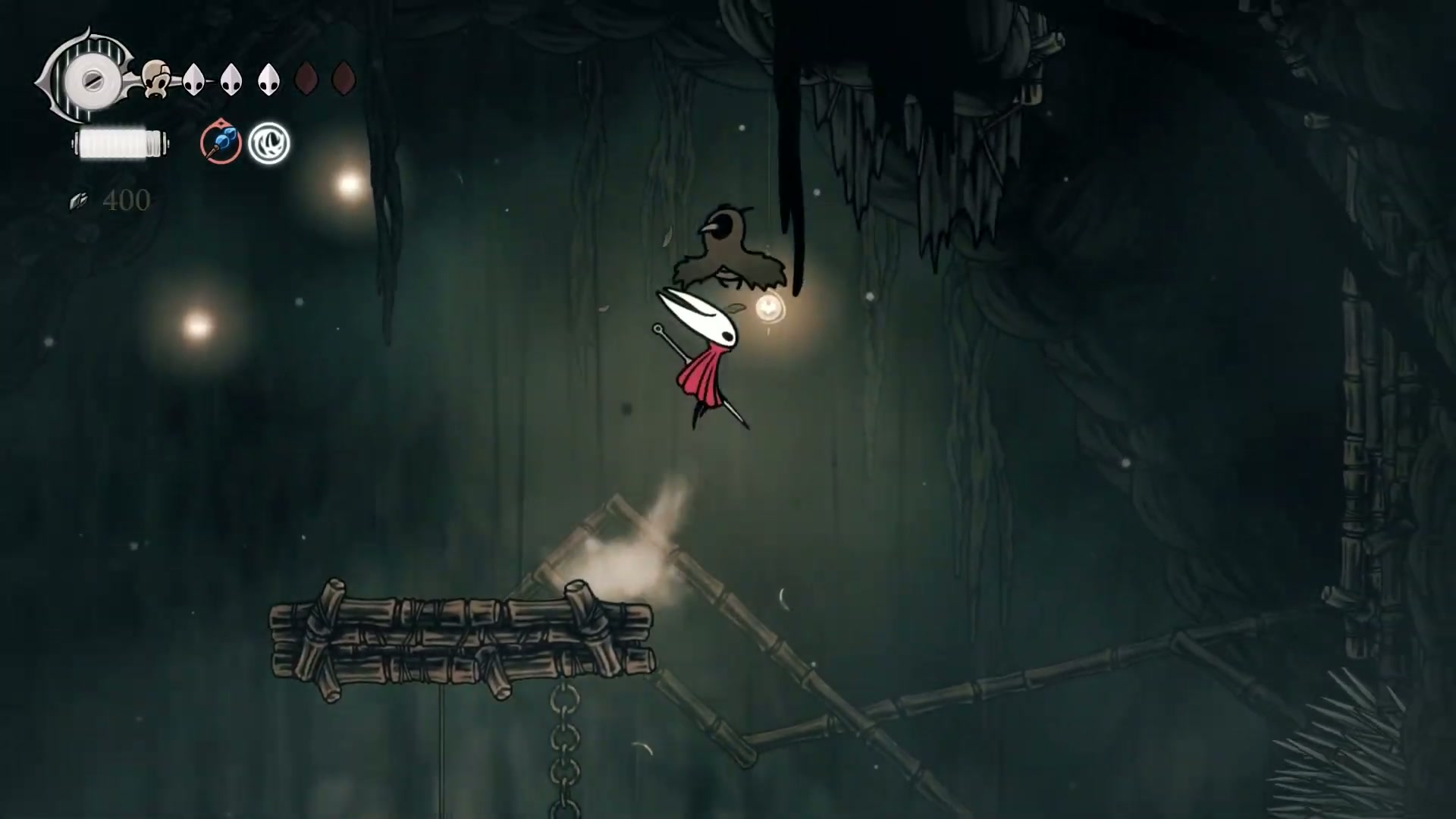 The entrance to Sinner's Road, a dark and ominous path in Silksong